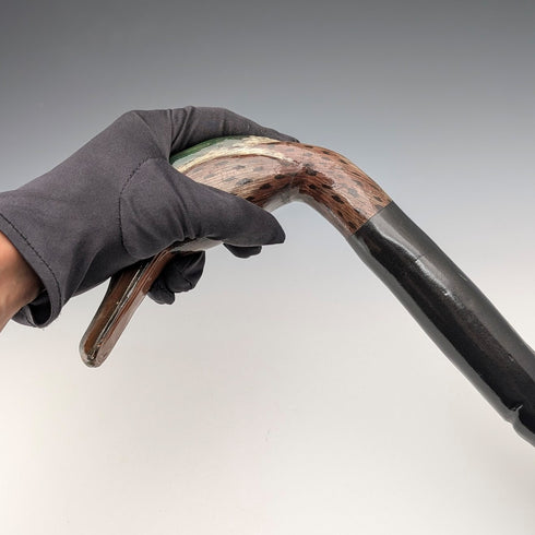 British vintage twisted black shaft walking stick with painted duckhead handle, 94cm